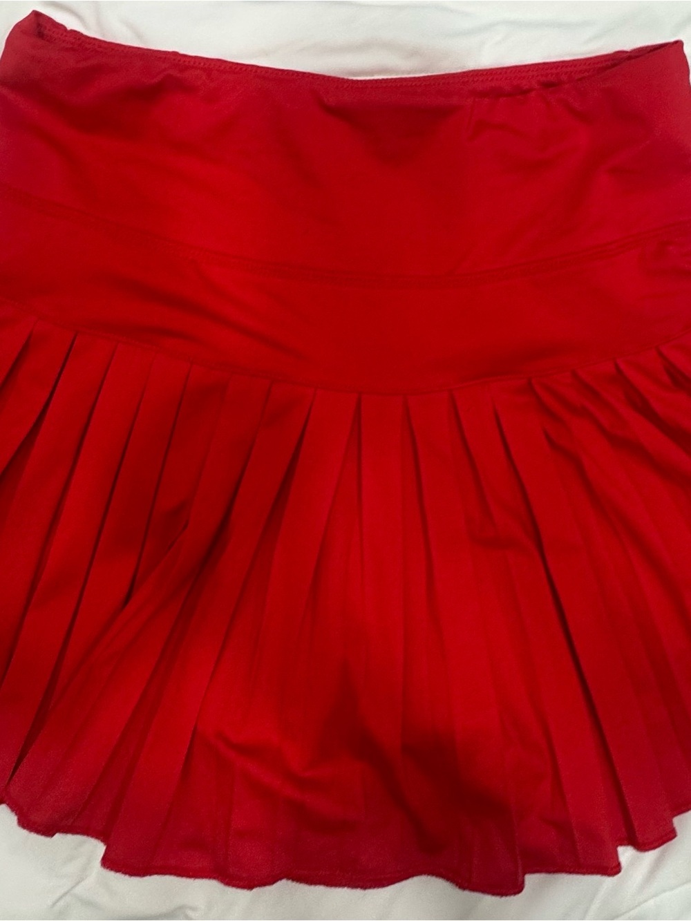 Red pleated skirt with built in shorts